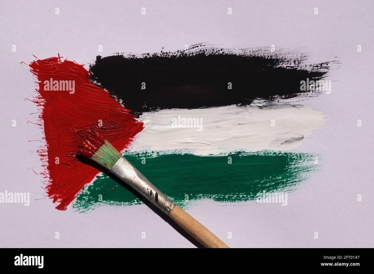 Pennello di bandiera Palestina su un foglio per sfondo e sfondo, selezionato fuoco. Foto Stock