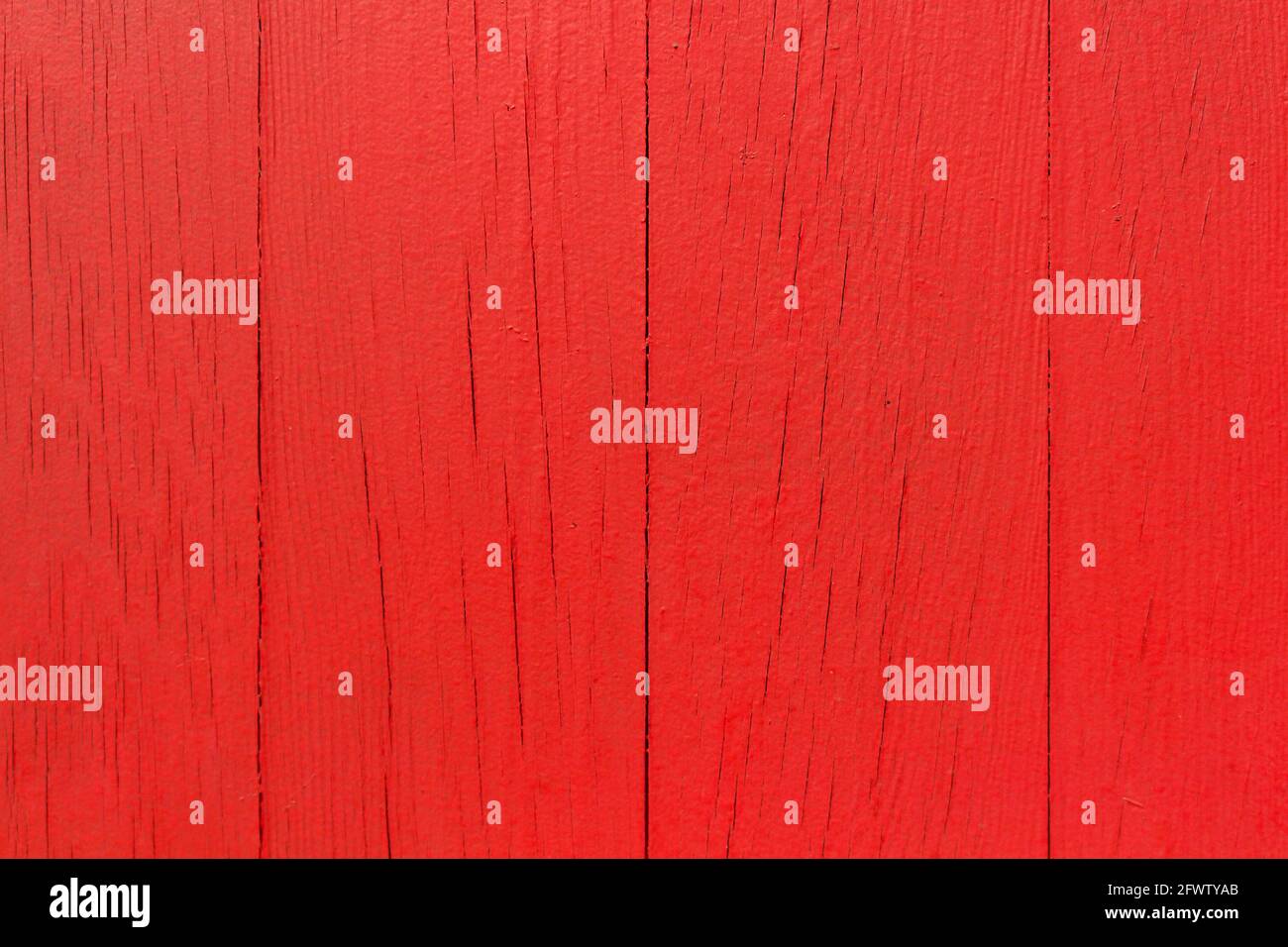 Vista ravvicinata dello sfondo in legno dipinto di rosso. Foto Stock
