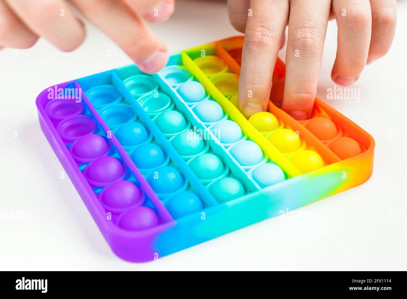 Schiocalo. Giocattolo alla moda per bambini. Foto Stock