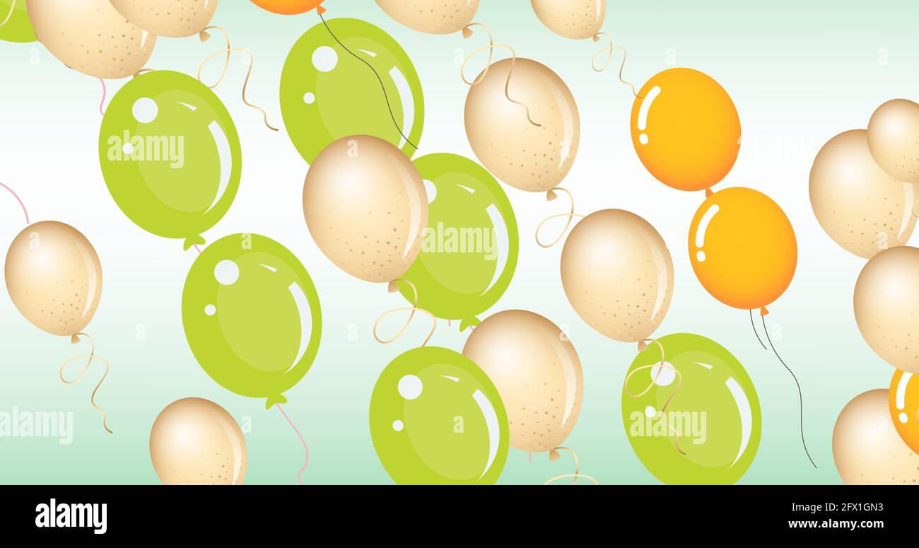 Composizione di palloncini multipli gialli e verdi su sfondo blu Foto stock  - Alamy
