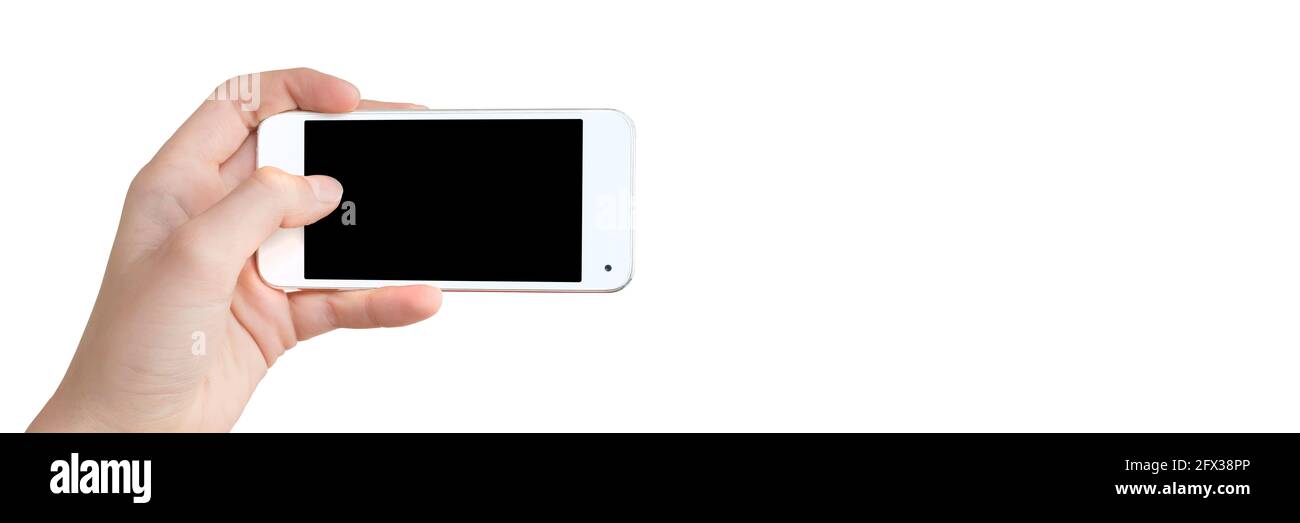 Mano che tiene un telefono, schermo vuoto, isolato su sfondo bianco panoramico Foto Stock