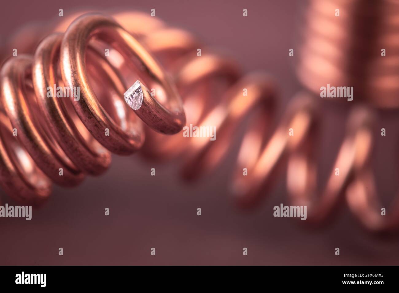 Macro vista delle materie prime del filo di rame industria dei metalli Foto Stock