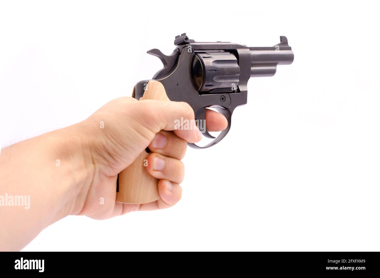 revolver in mano isolato su bianco Foto Stock