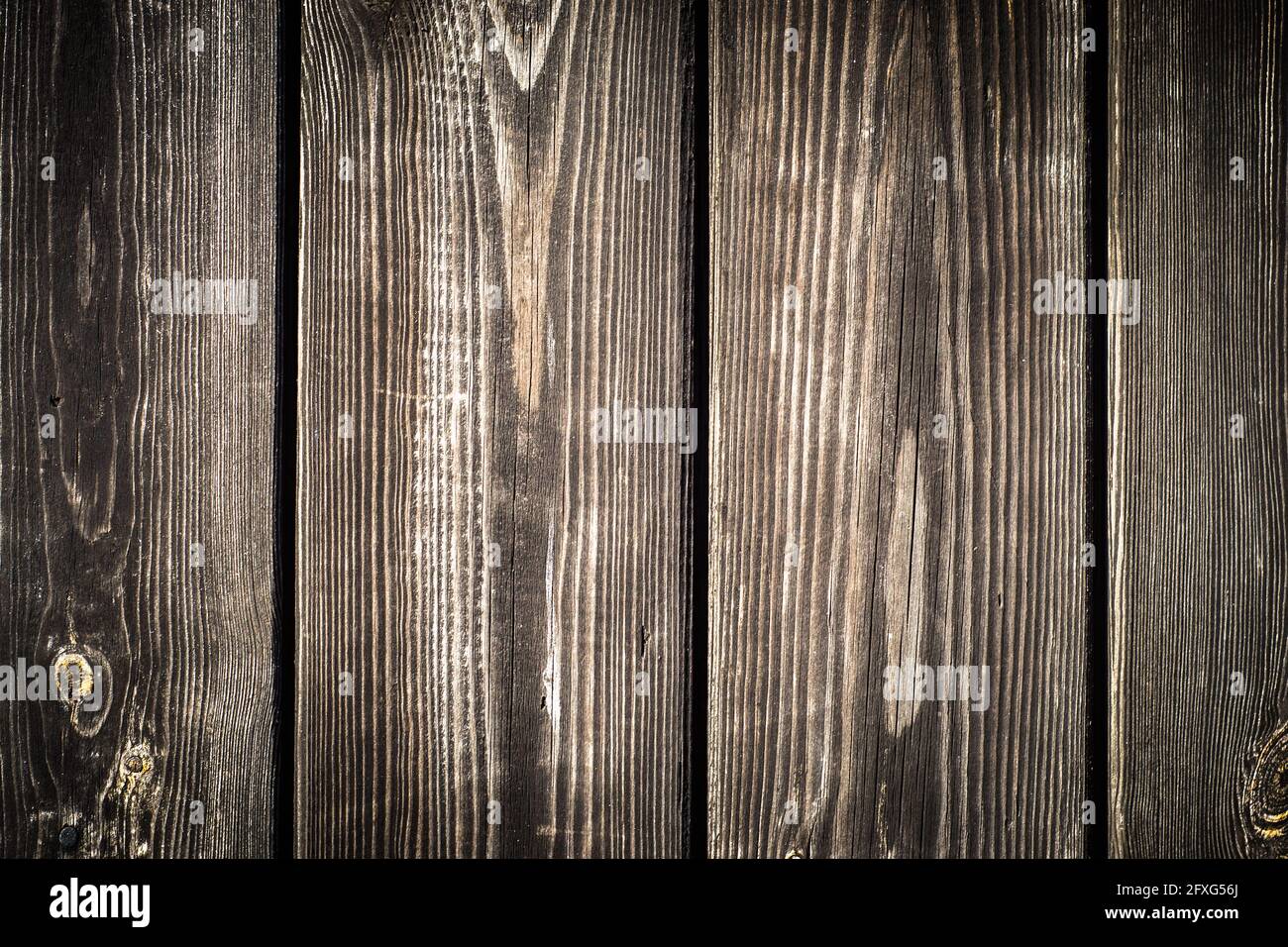 Struttura di sfondo in legno. Vecchie tavole di legno texture sfondo con vignette. Foto Stock