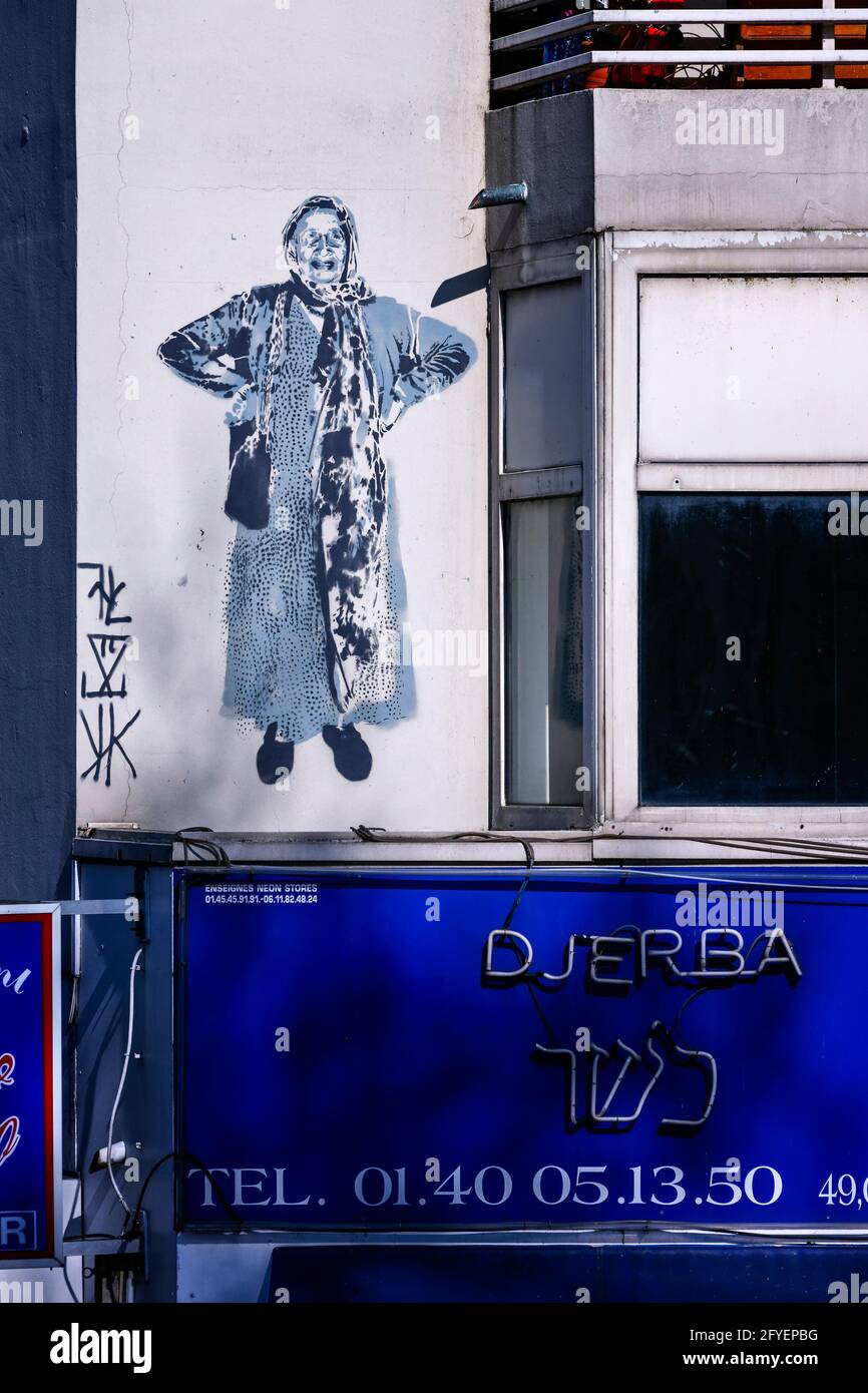 FRANCIA. PARIGI (75) GRAFFITI RAPPRESENTA UNA DONNA TUNISINA. QUAI DE LA SEINE PRESSO IL BACINO DELLA VILLETTE Foto Stock