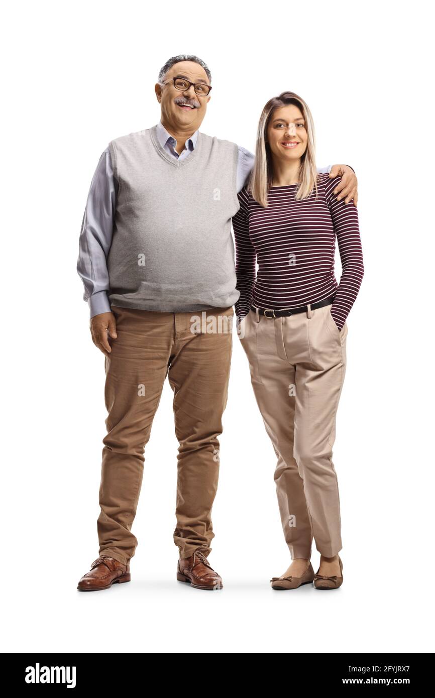 Ritratto a lunghezza intera di un padre orgoglioso che posa con lui figlia isolata su sfondo bianco Foto Stock