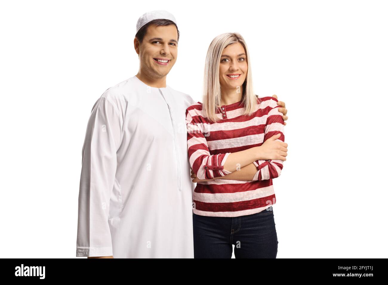 Giovane coppia di diverse religioni isolata su sfondo bianco Foto Stock
