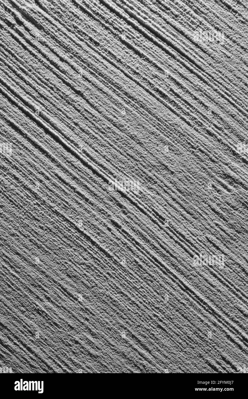 Linee diagonali calcestruzzo parete superficie sfondo Foto Stock