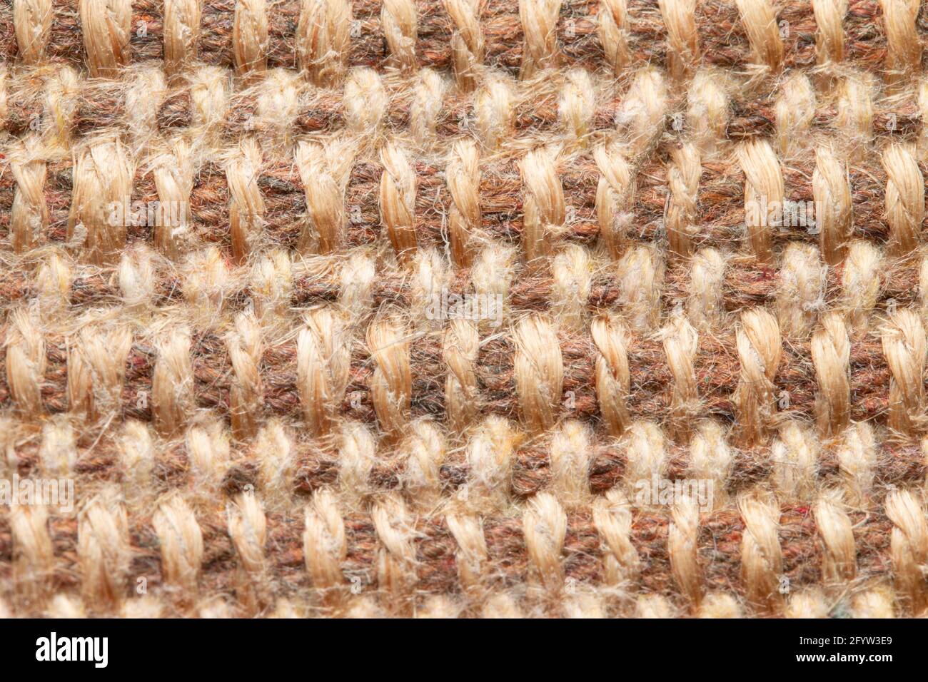 Primo piano in tessuto beige, canapa, materiale di fondo in iuta Foto Stock