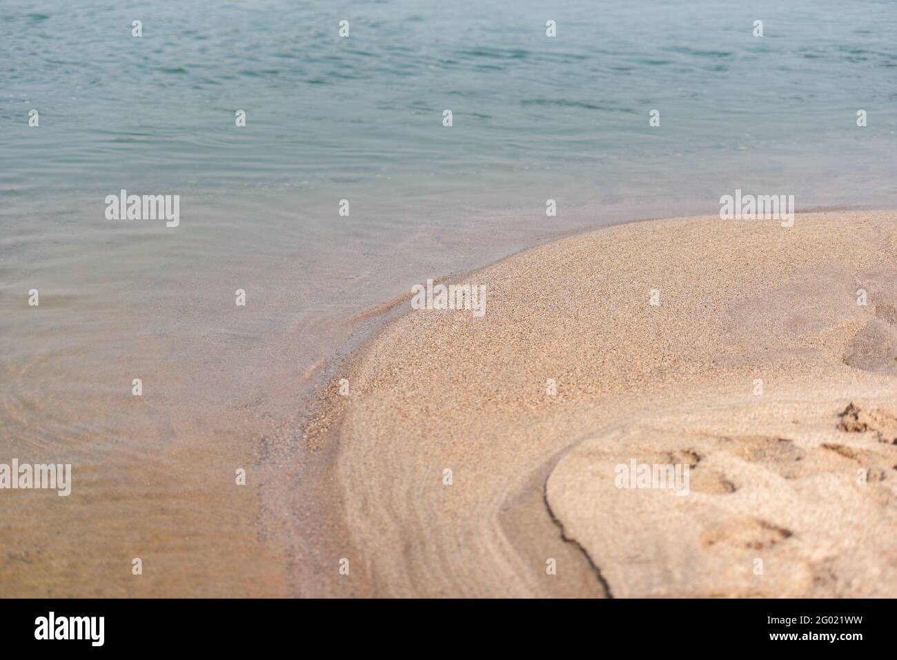 beach sea with sand nature blue water tropical beach on summer holidays Foto Stock