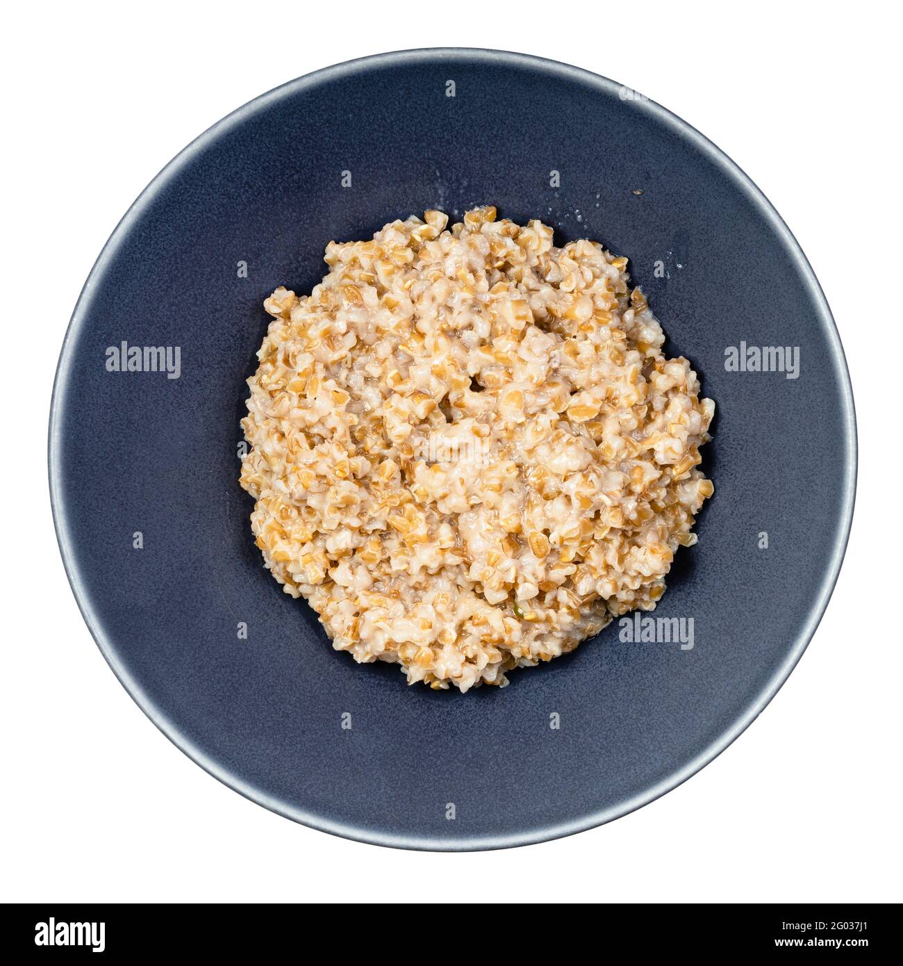 Vista dall'alto del porridge da Emmer farro sgranato bollito semina di grano in ciotola rotonda isolata su fondo bianco Foto Stock