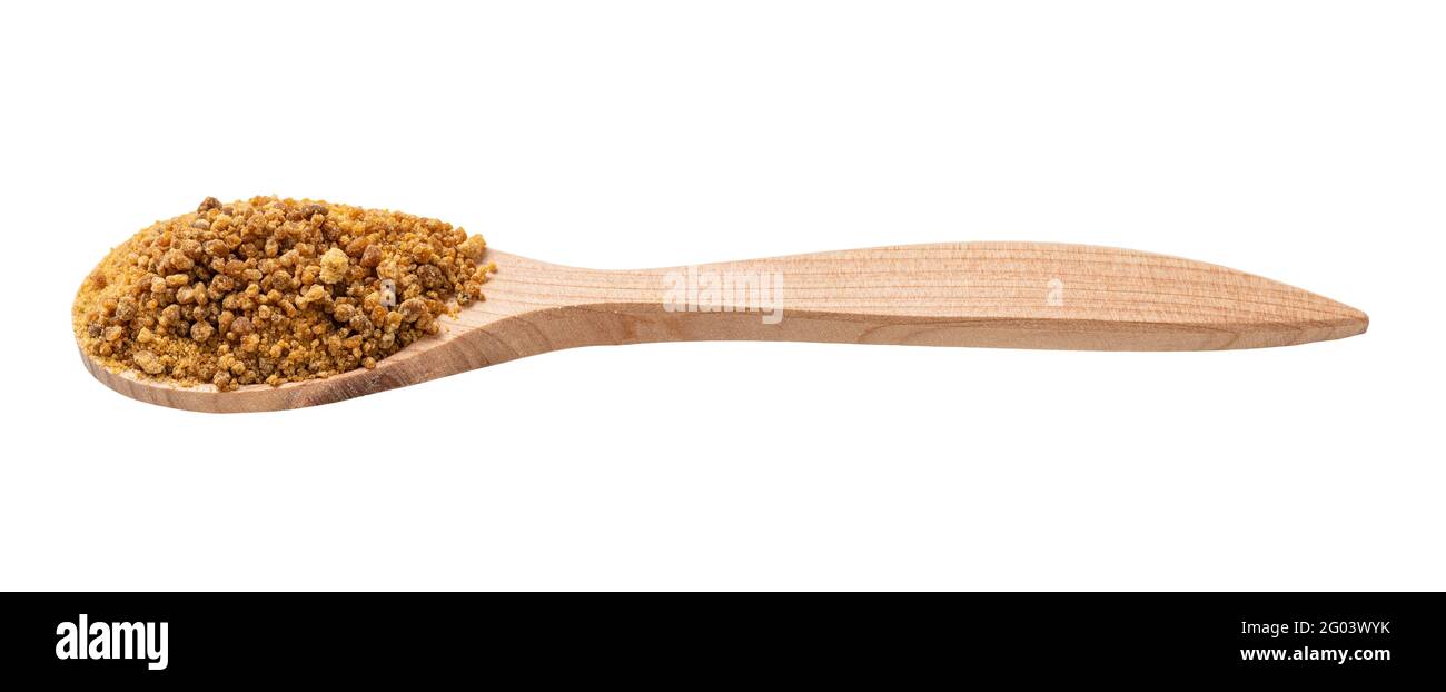 zucchero di cocco granulato in fiore in cucchiaio di legno isolato su bianco sfondo Foto Stock