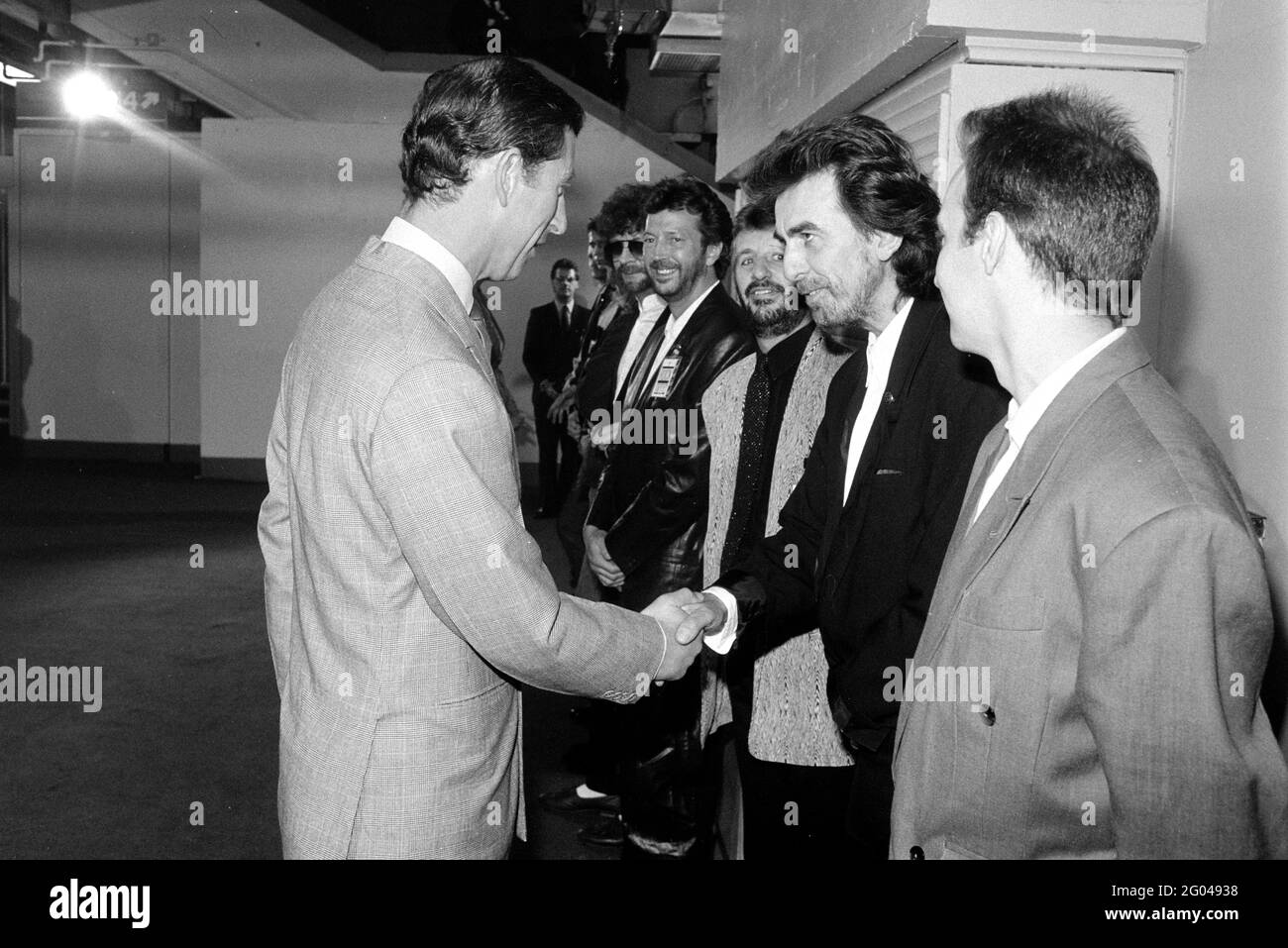 6.6.1988 il Principe del Galles incontra George Harrison, Ringo Starr e Eric Clapton all'evento di beneficenza della Principessa Trust. Foto Stock