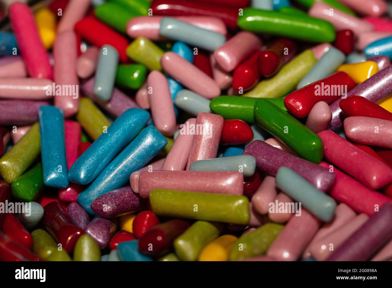 Bastone di gelatina multicolore caramelle sfondo testurizzato Foto Stock
