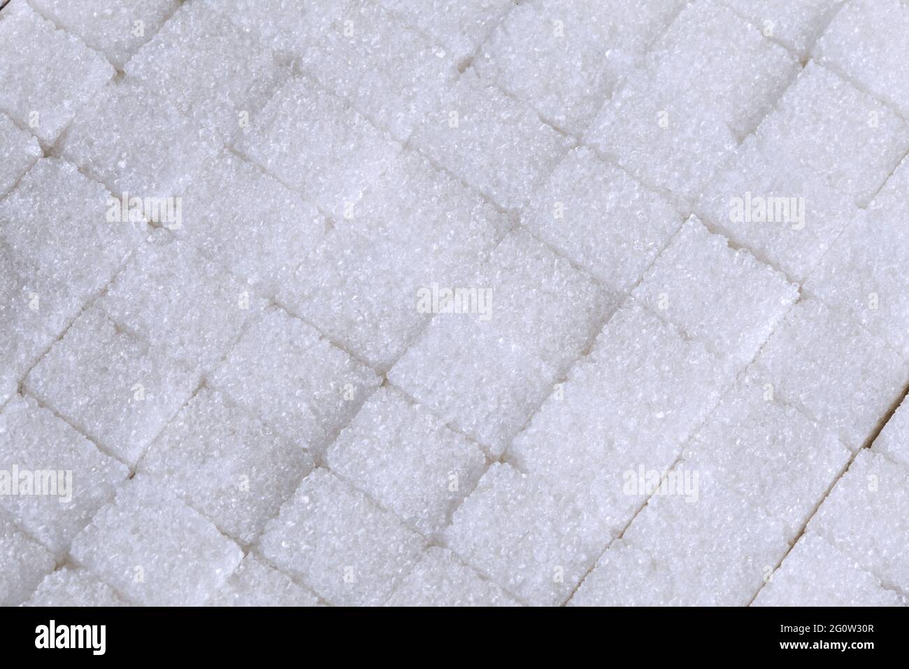 Sfondo o struttura cubica di zucchero bianco Foto Stock