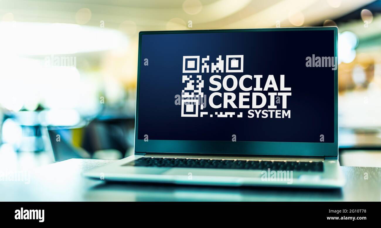 Computer portatile che mostra il segno del sistema di credito sociale Foto Stock