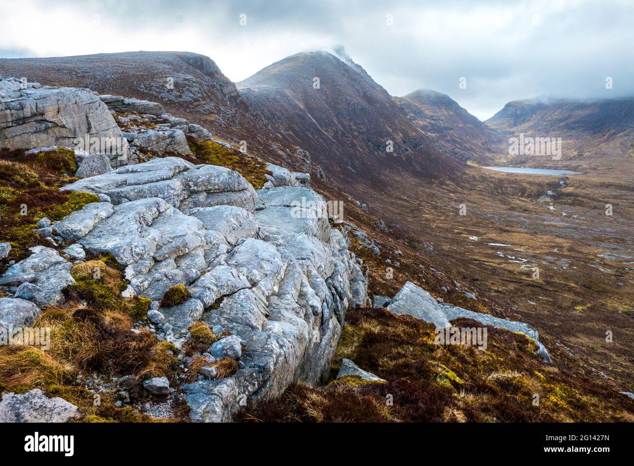 Quinag, una montagna in Assynt, negli altopiani nord-occidentali della Scozia Foto Stock