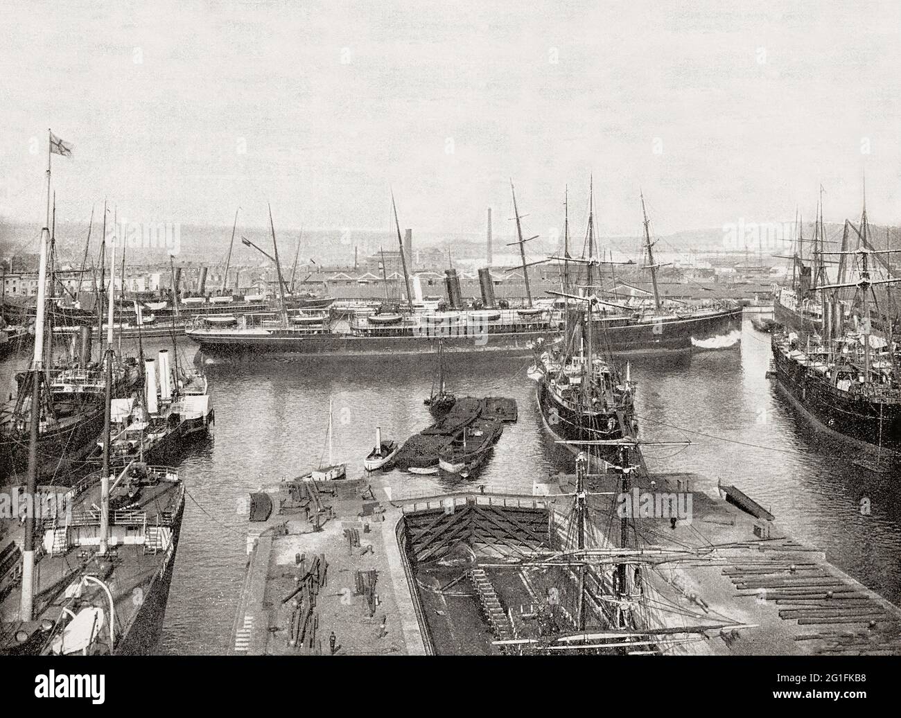 Una vista del tardo 19 ° secolo dei moli affollati nel porto di Southampton, un porto passeggeri e merci nella parte centrale della costa meridionale dell'Inghilterra. Dal Medioevo alla fine del XX secolo, fu un centro di cantieristica navale e un punto di partenza per i soldati in guerra. L'apertura della ferrovia a Londra nel 1840 ha dato un impulso al porto e le navi sono arrivate in numero che hanno sopraffatto le banchine e le banchine della città, E il primo molo fu inaugurato nel 1843 e molti altri fino al 1890, quando la Regina Vittoria aprì l'Empress Dock, più grande e più profondo di quelli precedenti. Foto Stock