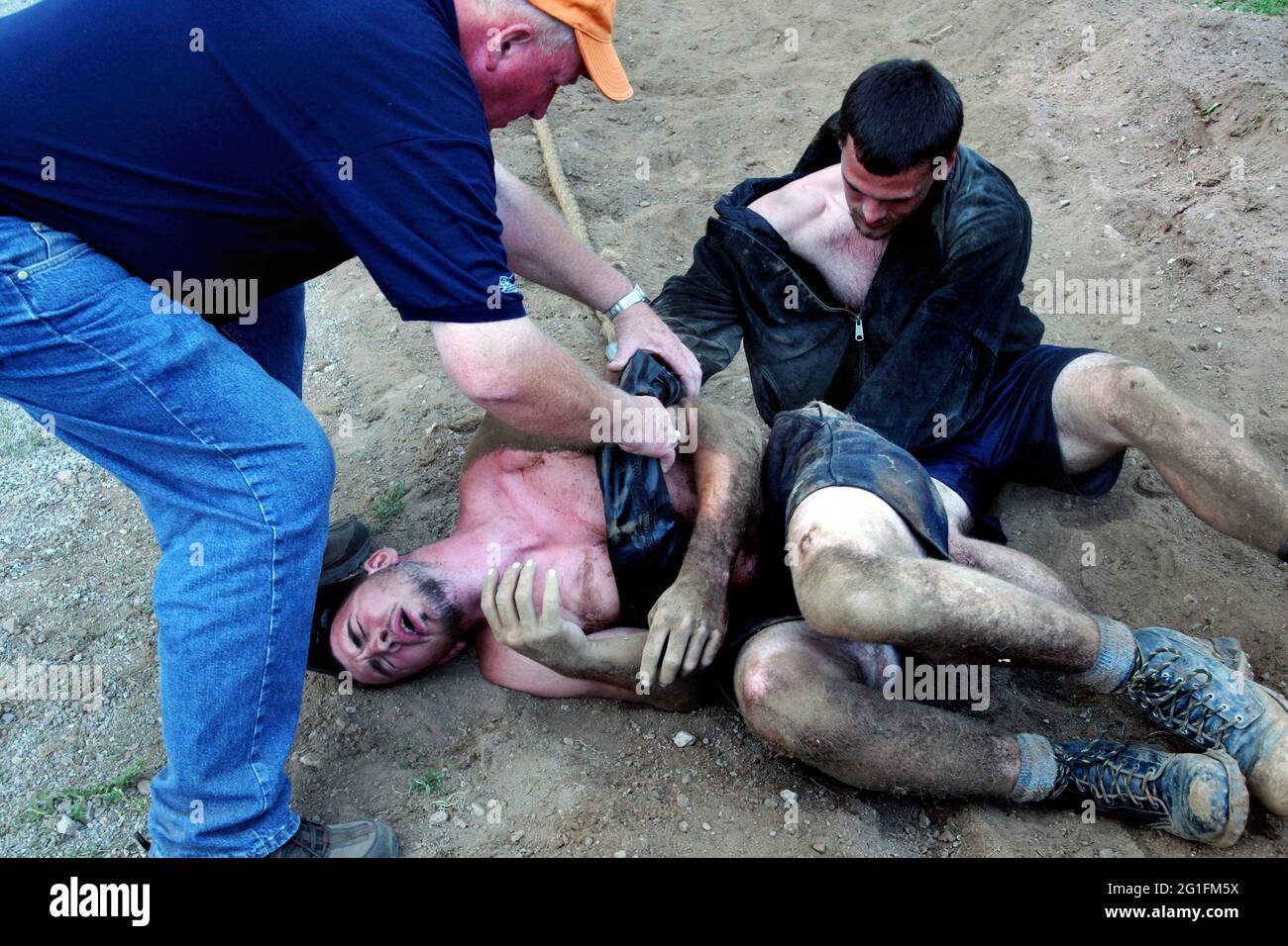 Highlandgames, Highland Games, Tug-o-War, Tug of war, tiro con la corda, Partecipante esausto, collasso, Scozia, Gran Bretagna, Antigonish, Novo Scotia Foto Stock