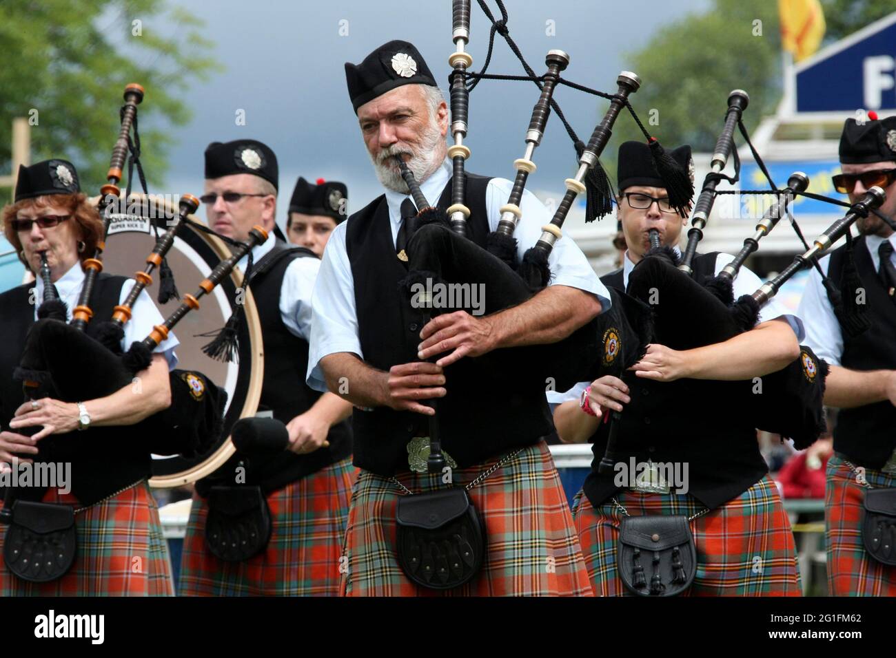 Highlandgames, highland games, pipeband, banda di cornamusa, piper, bagpiper, cornamuse, tartan, assegni, Scozia, America del Nord, America, Gran Bretagna Foto Stock