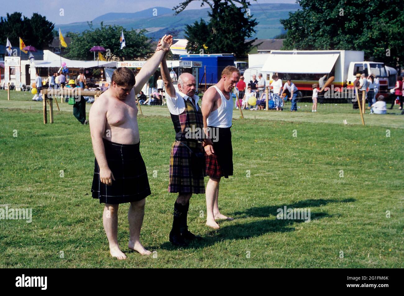 Highlandgames, Highland Games, atleti, lottatori, wrestling, wrestling, cerimonia di premiazione, kilt, tartan, plaid, Scozia, Gran Bretagna Foto Stock