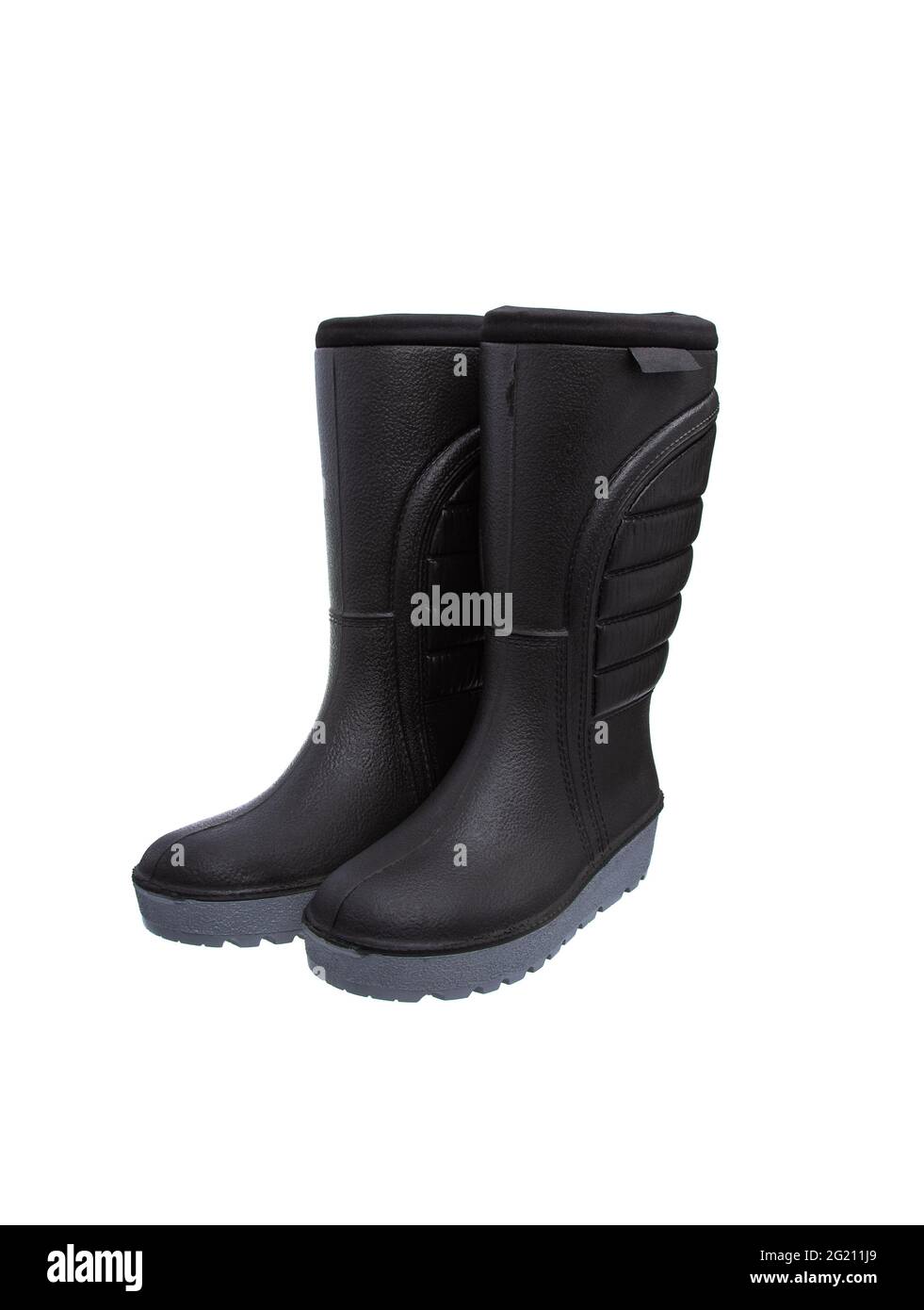 Scarpe per maltempo. Stivali in gomma caldi con suole del trattore isolate  su sfondo bianco Foto stock - Alamy