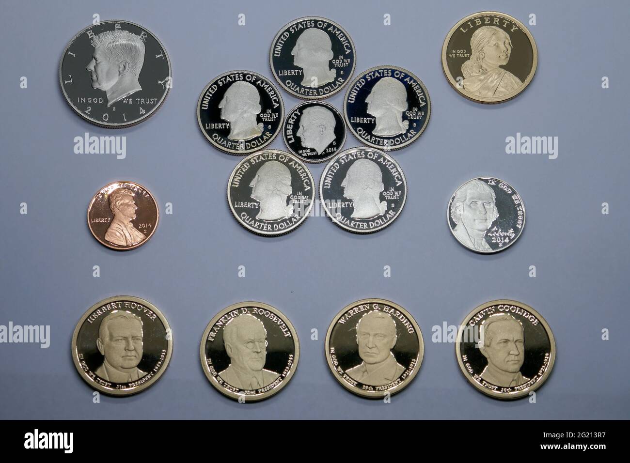 1, 5, 10. 50, 25 centesimi, monete da 1 dollaro. Finitura a specchio con texture ad alto rilievo. Foto Stock