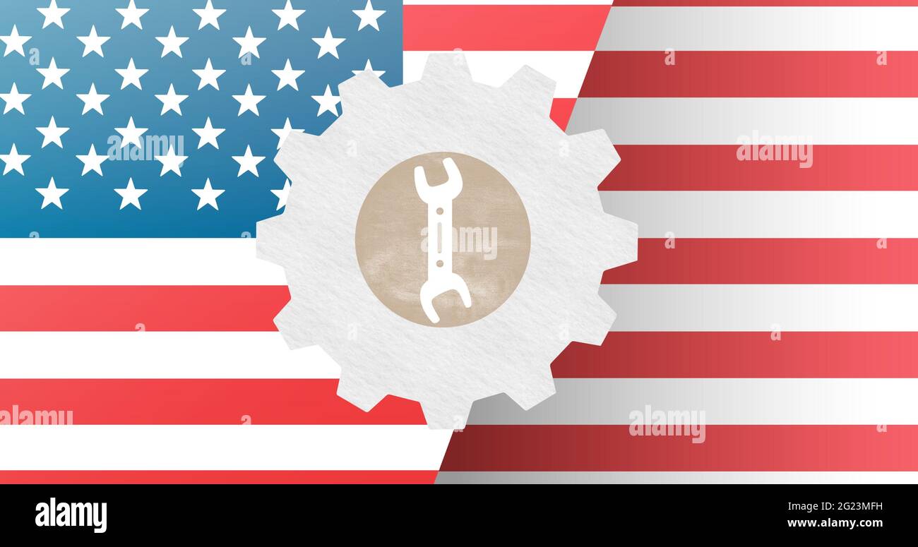 Strumento di lavoro sopra l'icona di impostazione contro la bandiera americana in background Foto Stock
