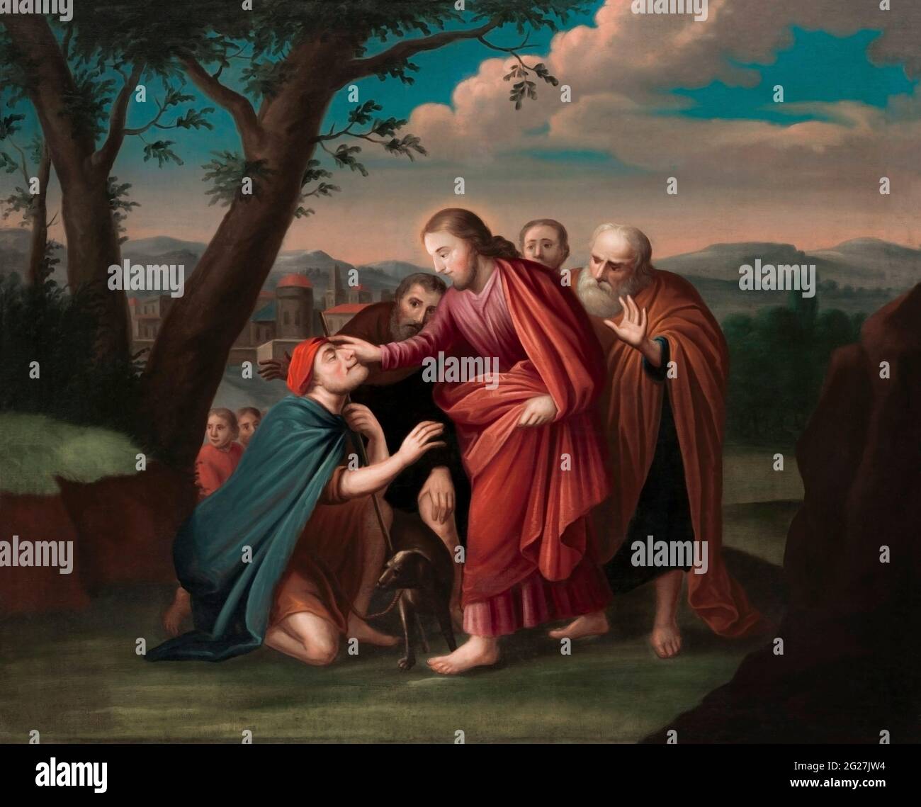 Gesù Cristo guarisce un uomo cieco mentre un certo numero di seguaci guarda sopra. Foto Stock