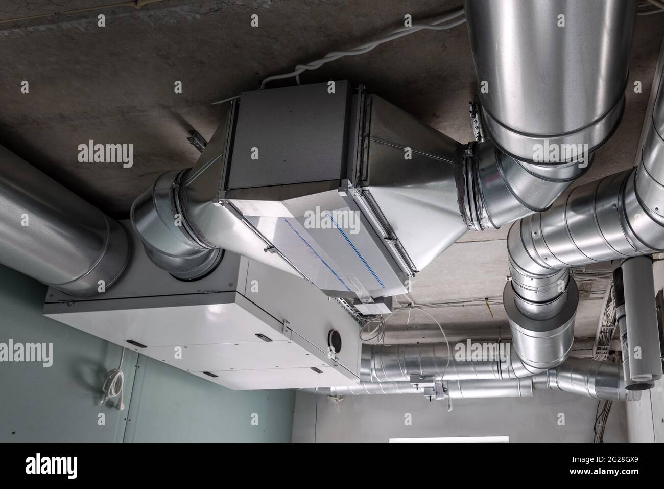 sistema di ventilazione a recupero di calore intubato con recupero Foto Stock