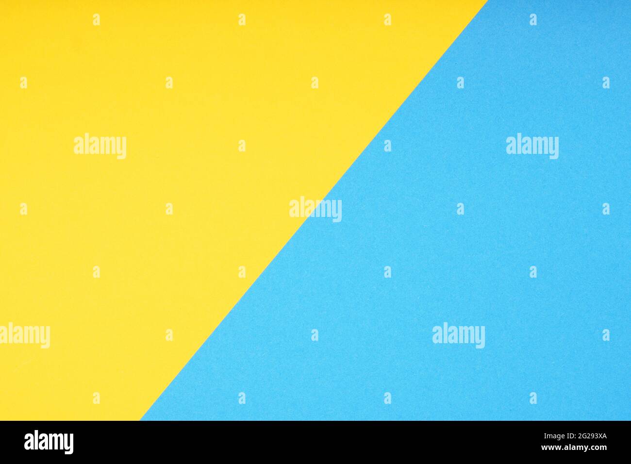 sfondo in carta a due colori in giallo e blu Foto Stock