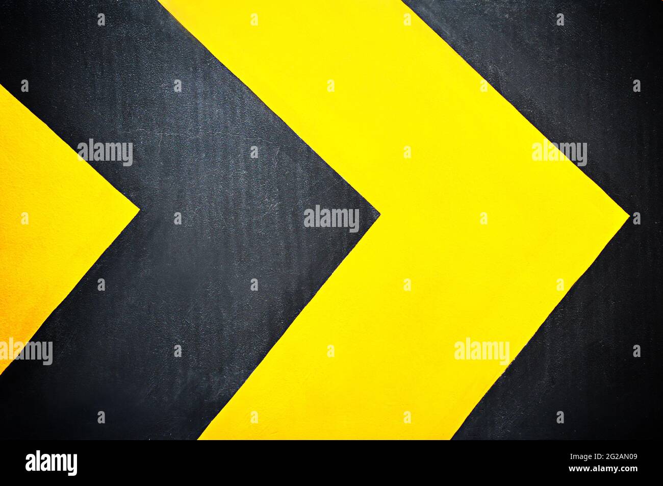 Frecce gialle e nere - cartello stradale Foto Stock