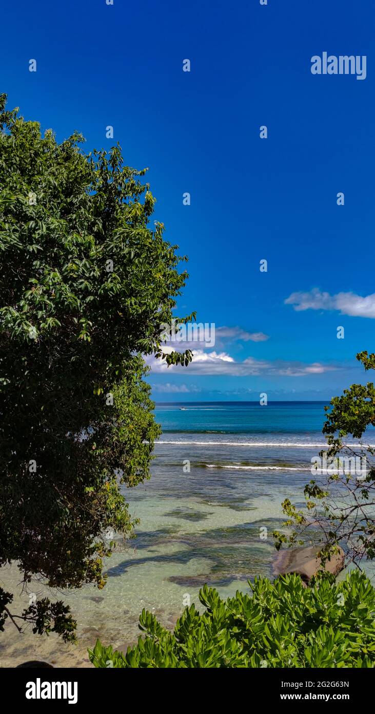 Spiaggia dell'Oceano Indiano, acque cristalline, Seychelles, Mehe, Glacis Foto Stock