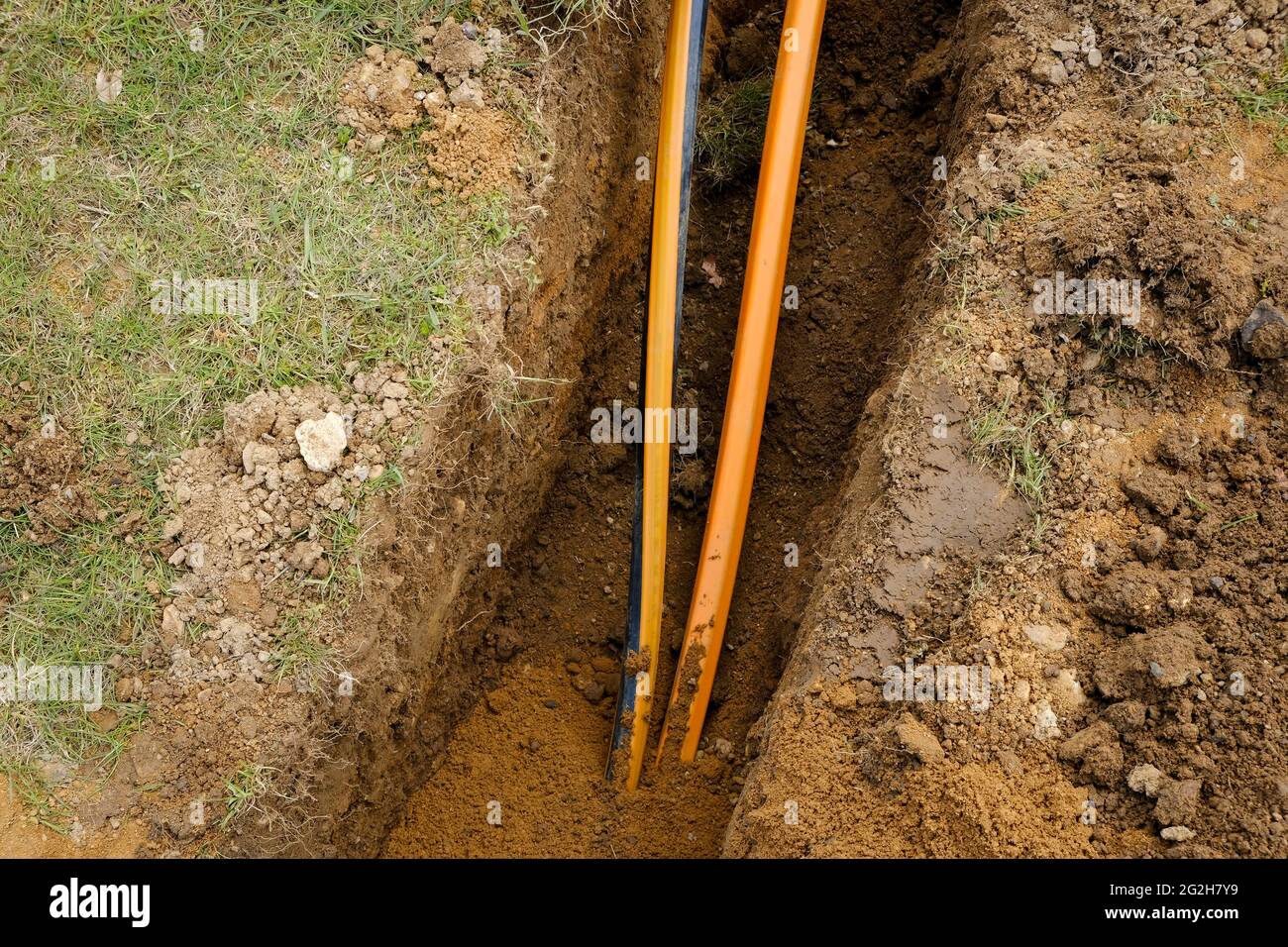 Rheinbach, Nord Reno-Westfalia, Germania - espansione della banda larga di Internet, cantiere interramento di cavi in fibra ottica, nuova costruzione di fibra o Foto Stock