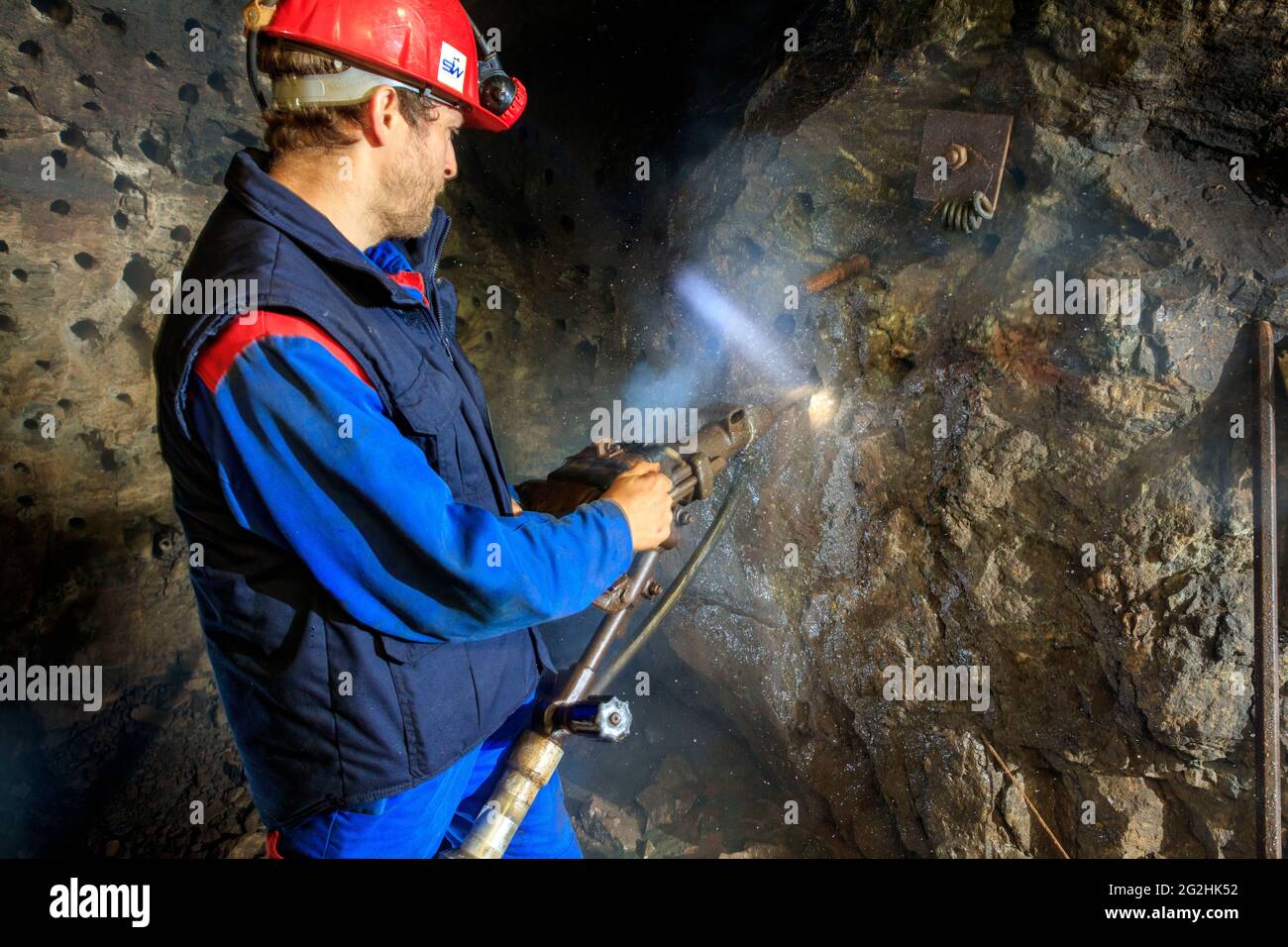 Miniera di stagno: Perforazione manuale nella miniera per visitatori di Pöhla vicino ad Aue Foto Stock