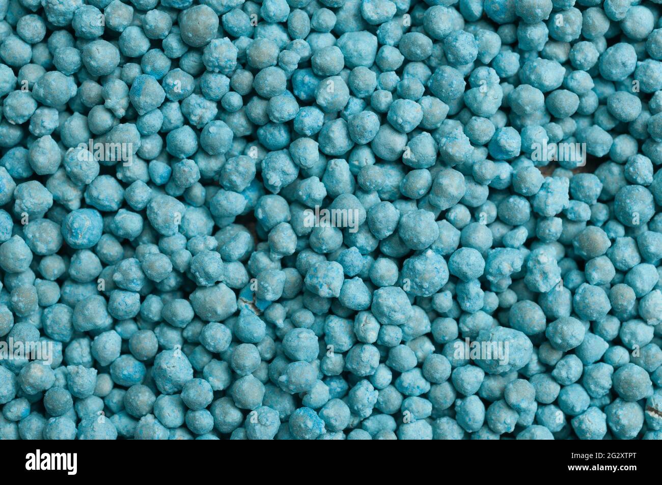 Grani di fertilizzante di azoto per uso agricolo Foto Stock