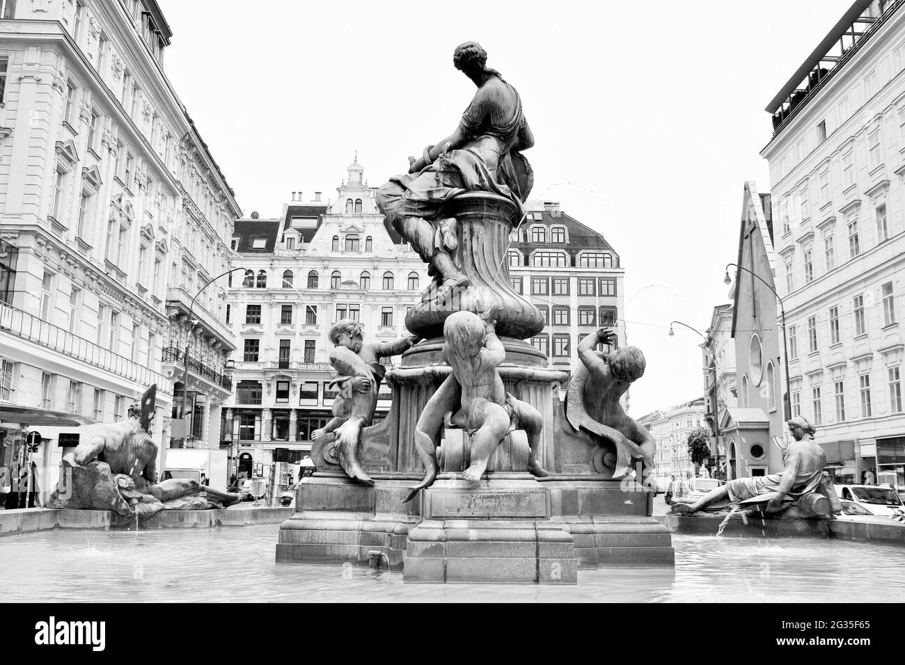 La Donner Fontana (Donnerbrunnen) nel Neuer Markt di Vienna, Austria Foto Stock