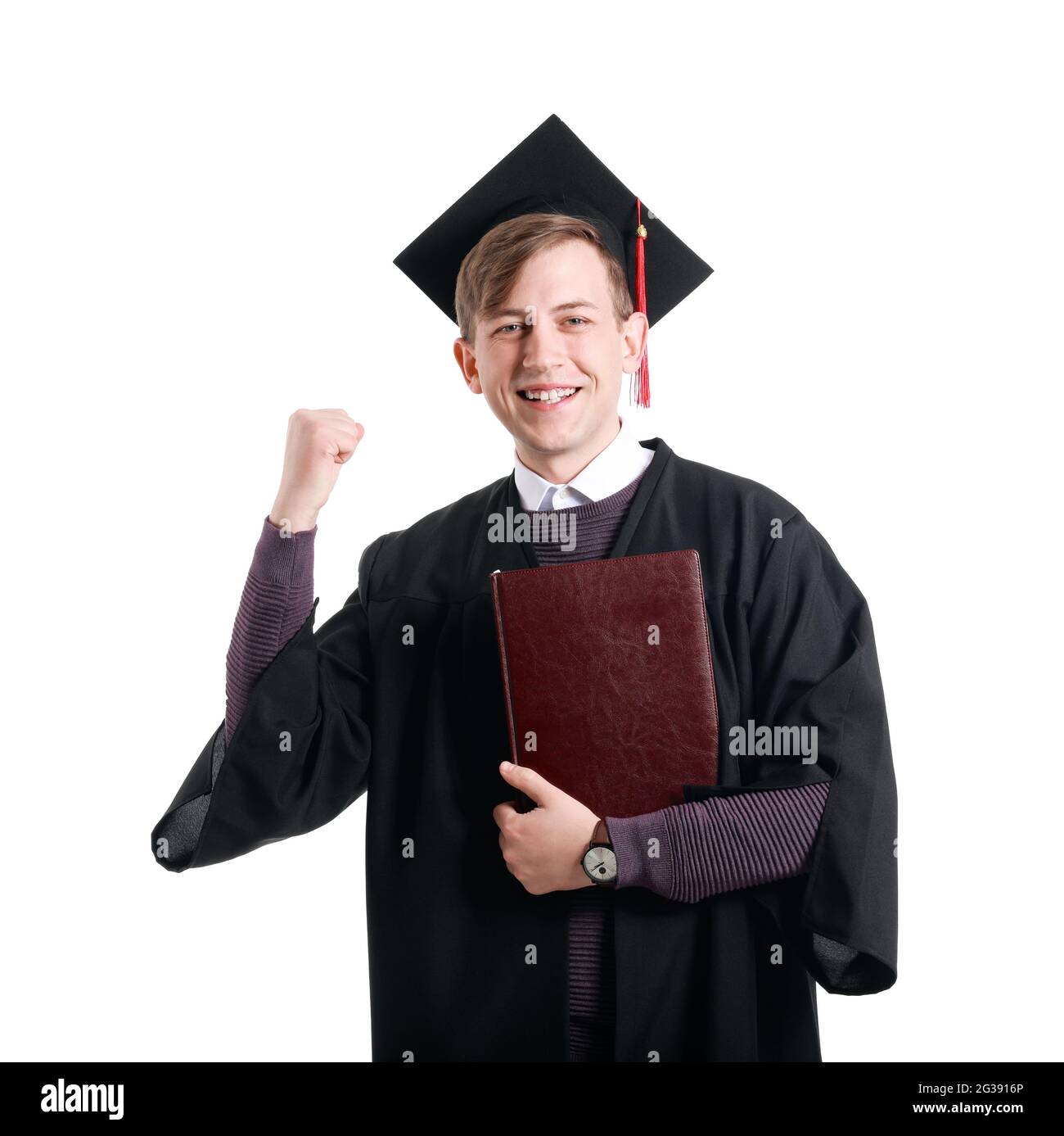 Felice studente laureato su sfondo bianco Foto Stock
