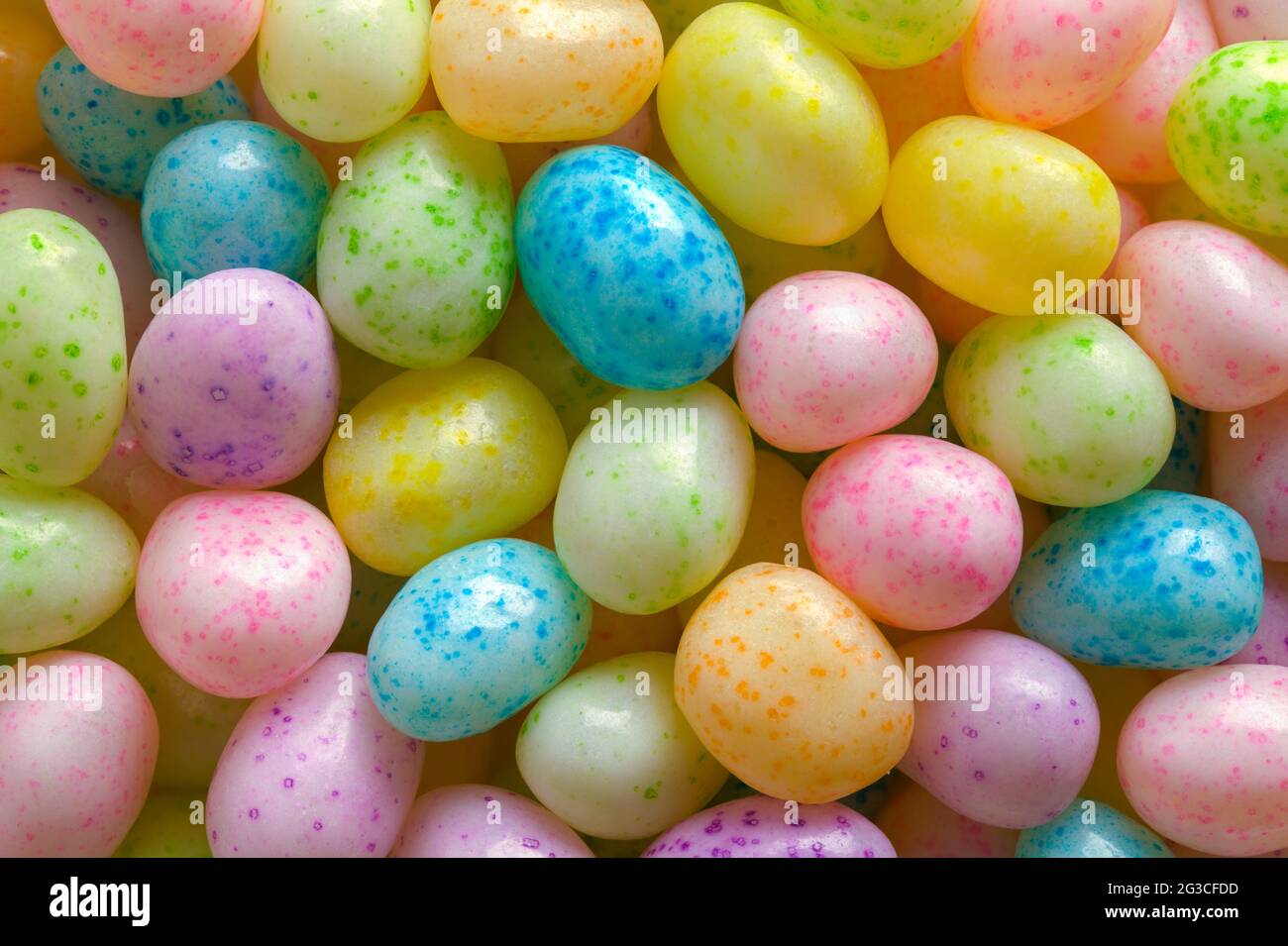 Colorato uovo di Pasqua Jelly Beans trama di sfondo. Foto Stock
