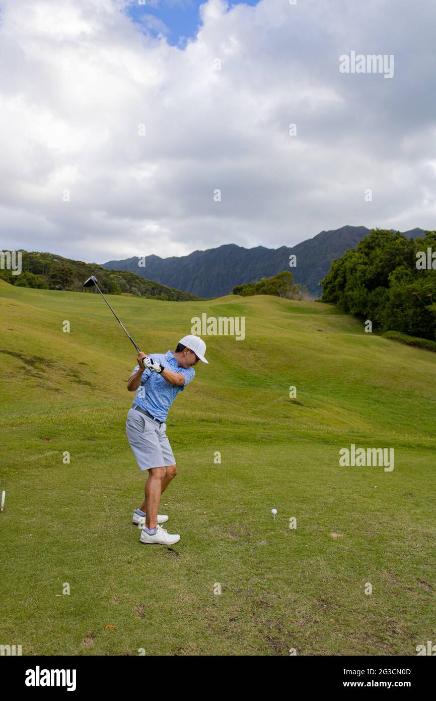 Belle riprese ad alta velocità di scatto di altalene da golf nel Royal Hawaiian Golf Club, in Oahu Hawaii Foto Stock