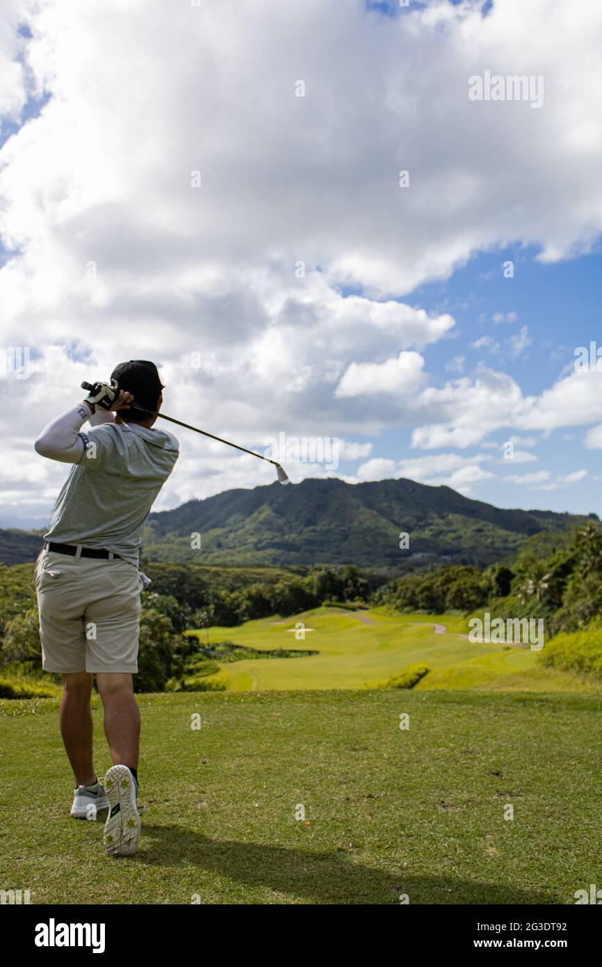 Belle riprese ad alta velocità di scatto di altalene da golf nel Royal Hawaiian Golf Club, in Oahu Hawaii Foto Stock