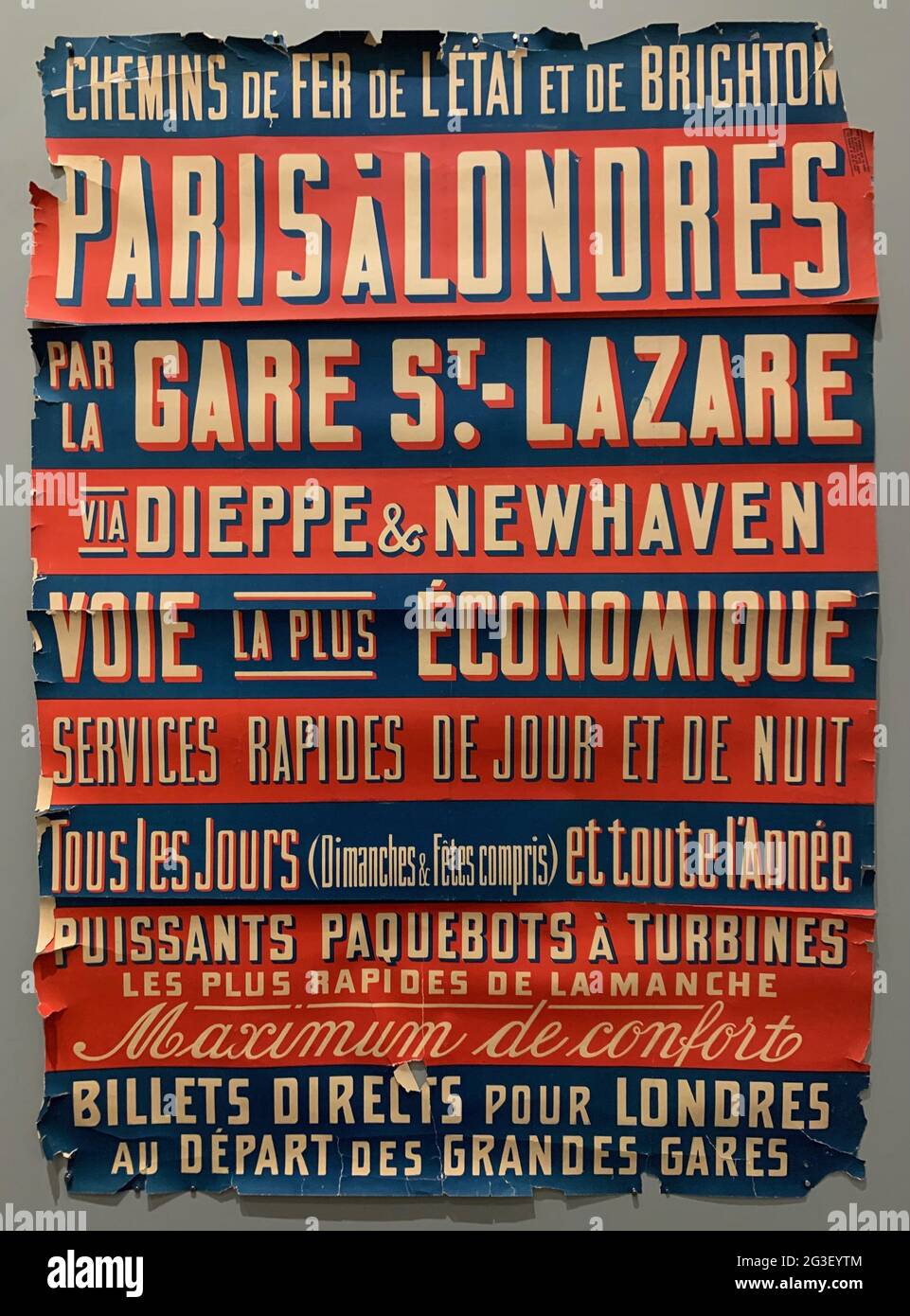 Cartellone vintage. Parigi. Gare St. Lazare, ecc. bordi di Thorn. Strisce blu e rosse. Bella tipografia. Foto Stock
