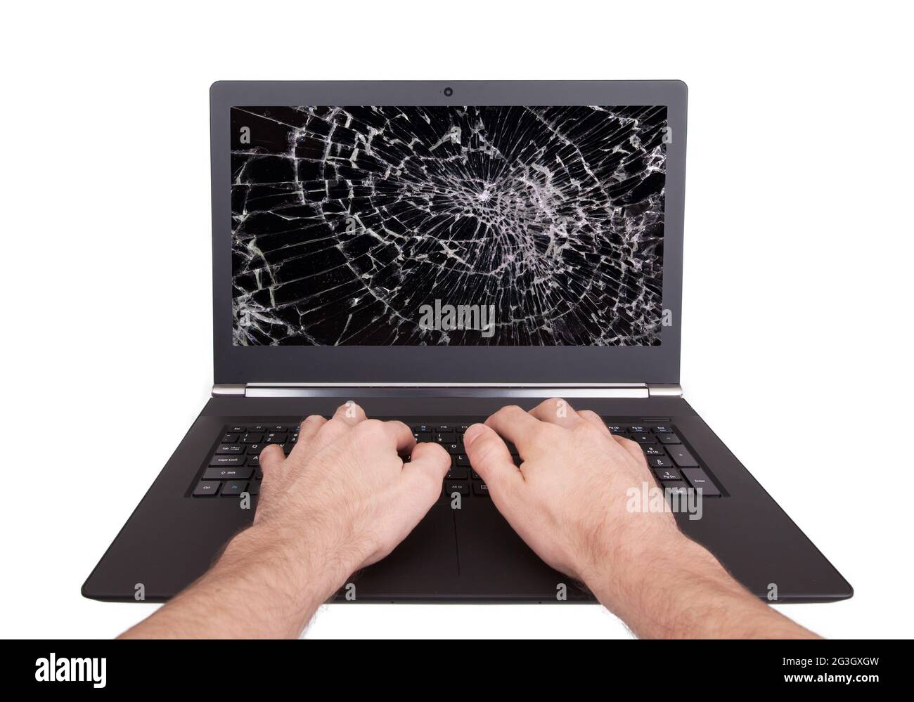 Uomo che lavora su un computer portatile con uno schermo rotto Foto stock -  Alamy