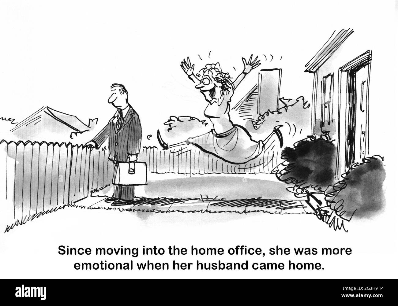 La moglie che lavora a casa è estatica per vedere suo marito. Foto Stock
