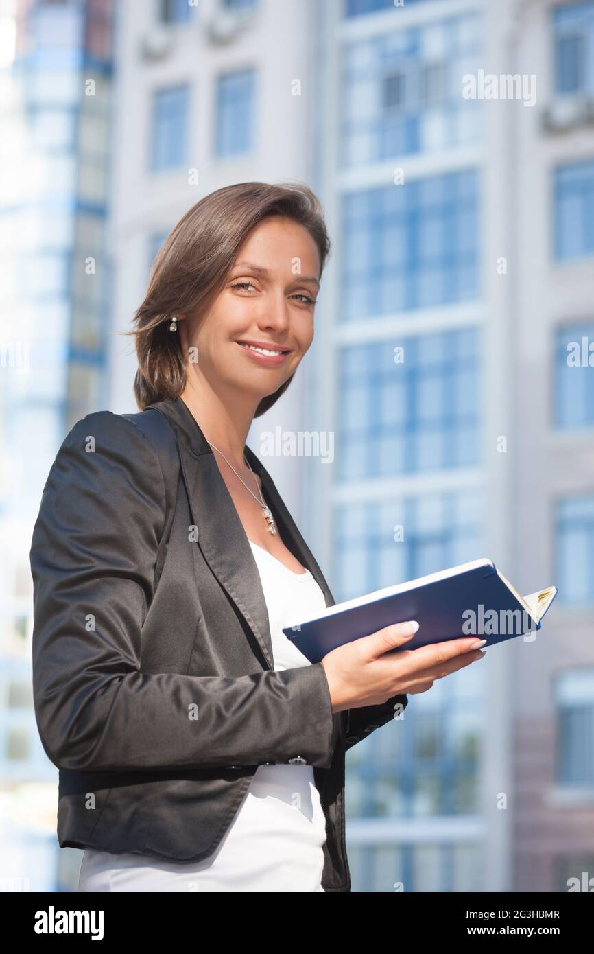 Business donna con diario Foto Stock