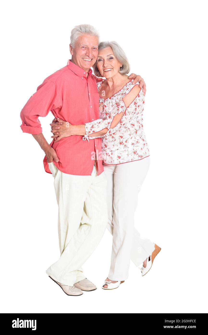 Felice coppia senior in posa isolati su sfondo bianco Foto Stock