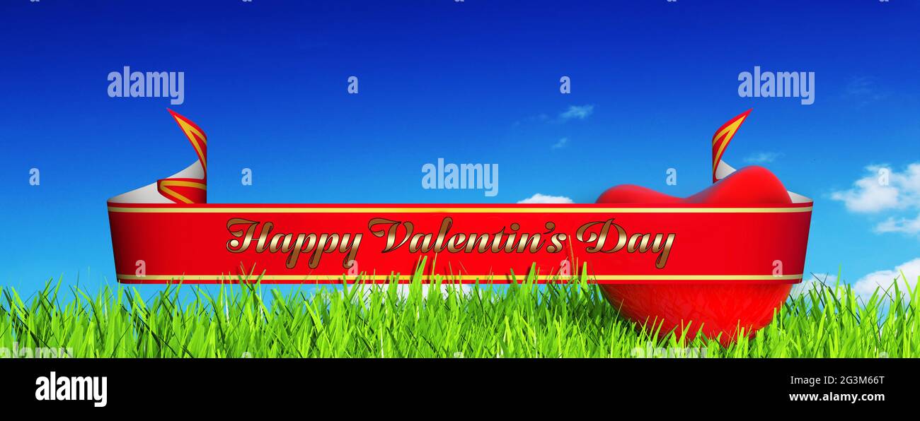 Cuore rosso sull'erba Foto Stock