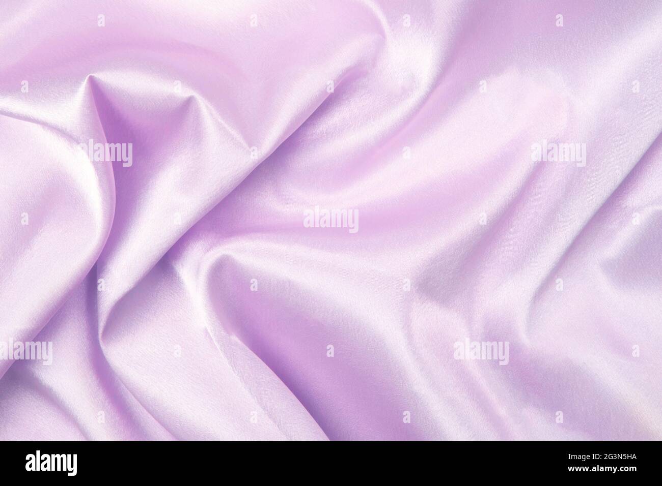 Modello di tessuto. Tessuto viola per disegno decorativo, sfondo astratto. Foto Stock