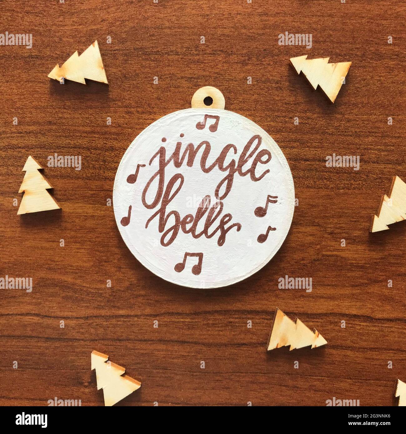 Natale ornamento in legno con canzoni Lyrics Foto Stock