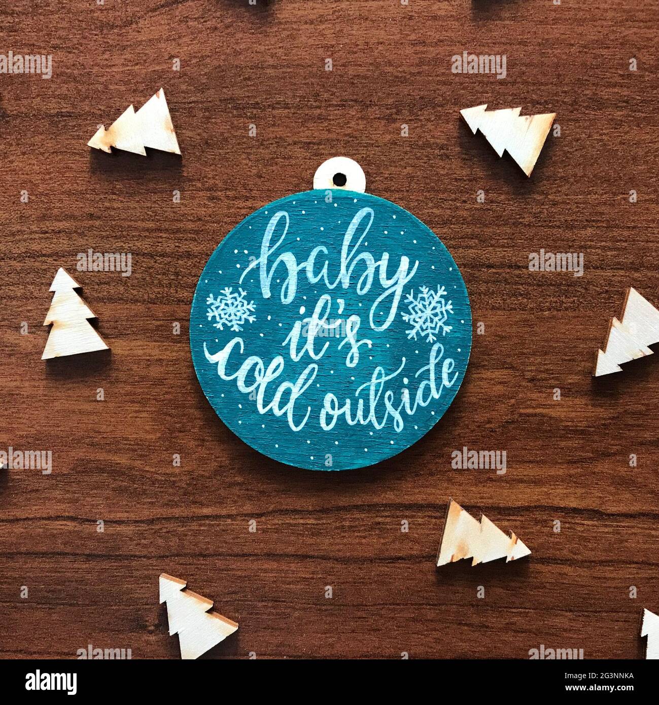 Natale ornamento in legno con canzoni Lyrics Foto Stock